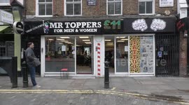 Long queues form outside hairdressers and salons in Central London