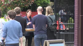Pubgoers in Greenwich enjoy a beer garden on Super Saturday