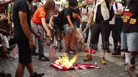 New York: Demonstrators burn American flags on Independence Day holiday