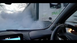 Terrifying moment lorry blasts UK road with smoke forcing drivers to pull over