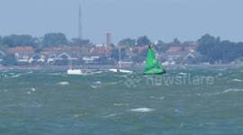 Rowers filmed attempting voyage around UK in very choppy seas