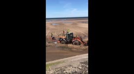 Tractor gets bogged down on Blackpool beach