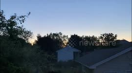 Shooting star caught on timelapse sunrise