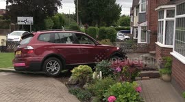 UK ambulance doctor crashes into house following collision with uninsured and unlicensed driver
