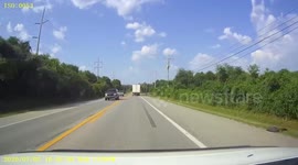 Mororcyclist Narrowly Avoids Head on Collision