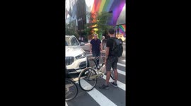 Man in BMW has testy exchange with protesters during Vanessa Guillen march in New York