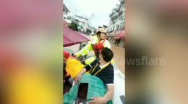 Chinese county suspends university entrance exam due to flash flooding