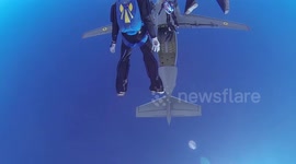 Heart-stopping moment skydivers in Ukraine recording multiple jumps out of military planes