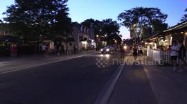 Hot summer night in Markham near Toronto with patios open and people out on main street during southern Ontario epic heatwave