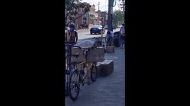 Volunteers on bikes deliver supplies to vulnerable people in Toronto