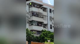 Chinese man climbs six floors barehanded to save girl hanging from window