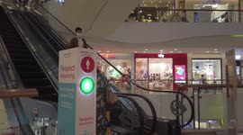Thai shopping mall uses traffic lights on escalators to enforce Covid-19 social distancing