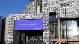 Portraits displayed on facade of Paris opera house in tribute to health workers