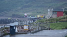 Coastguard helicopter beach rescue in Minster on Sea, Kent, UK
