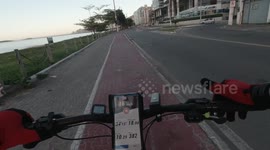 Biking next to the beach at 6:00 AM
