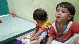 Children eating while sleeping