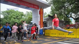 Excited Chinese student does split jumps after running out of exam centre