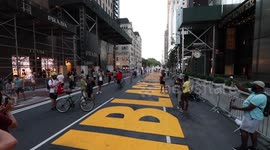 Black Lives Matter mural outside Trump Tower becomes instant attraction for New Yorkers