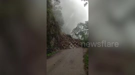 Rockslide in India sends boulders crashing down onto mountain road