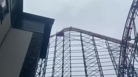 Thrill seekers climb to the top of UK's tallest rollercoaster without safety gear