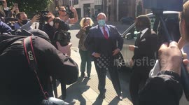 Johnny Depp walks into London High Court for libel court case