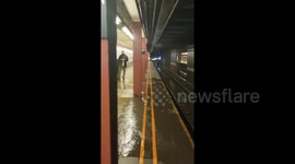 Tropical Storm Fay floods subway station in New York City