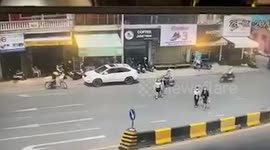 Moment woman suffers double motorcycle snatch theft in Cambodia