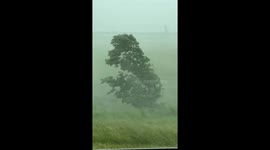 Tornado warned storms, insane winds in Minnesota with blowing debris. (1 of 5 videos.)