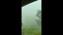 Tornado warned storms, insane winds in Minnesota with blowing debris. (1 of 5 videos.)