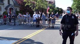 New York: Pro-NYPD demonstrators yell across barricade at Black Lives Matter marchers