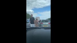 Ice cream van opens to motorists stuck on UK motorway on hot day