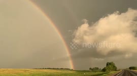 Storm chaser captures rainbow-filled sky after torrential downpour in South Dakota