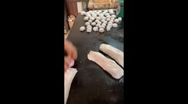 The man shows off his skill at making bread from flour very quickly