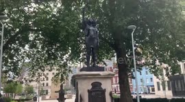 A statue of Black Lives Matter protester appears on Edward Colston plinth