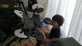 Two-year-old in Brazil shows off impressive drumming skills