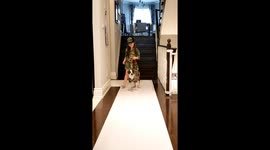 Kids and dog put on fashion show