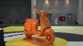 Stunning all-orange model Vespa displayed at Bangkok Motor Show