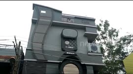Photography enthusiast builds camera-shaped house in southwest India