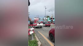 Careless Driver Stops Over Tracks As Train Approaches
