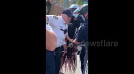 NYPD detain protesters for allegedly 'sitting down'