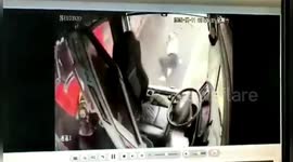 Chinese bus driver gets catapulted out of bus after massive truck collision