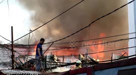 Dozens of homes destroyed as fire rips through residential area in Jakarta