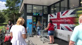 Shoppers use a traffic light system to enter ALDI in Hemel Hempstead