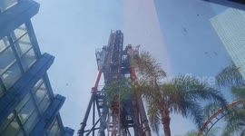 Terrifying moment rollercoaster broke down leaving screaming riders stranded 100ft off the ground