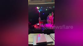 Dog steals the show while dancers are on stage