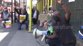 Protesters gather following UK police officer kneeling on man's neck