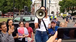 Anti-mask and anti-government protesters rally in London
