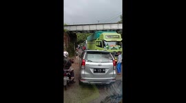 Truck and minibus drivers fight on the road as the road scrambles