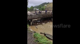 Rescue operations underway as flooding destroys bridges in Russia