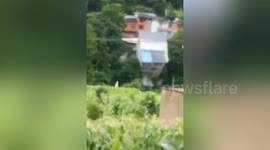 Family home in China completely collapses into river due to continuous rainfall